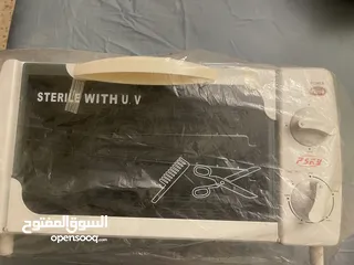  2 جهاز تعقيم لأدوات الحلاقه مع جهاز واكس
