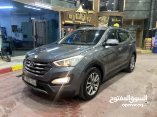  1 هونداي سنتافيه 2015 مطور 2000 ديزل اتوماتيك فل الفل بدون فتحه بسعررررر 66000 الف بسعرررر حرررق