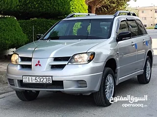  1 ميتسوبيشي آوتلاندر اوتوماتيك 2003 توب نظافة بسعرررر مميززز محرك 2400cc