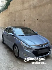  12 هونداي سوناتا هايبرد موديل 2014 مميزة لون ازرق بلو فل اضافات