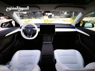  1 تيسلا 2023 model 3 فحص كامل اوتوسكور لون اسود ملوكي داخلي ابيض بحالة الوكالة للبيع بسعر لقطة ومحرووق