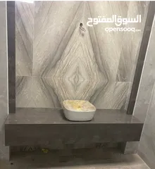  11 كونترات استقبال ومغاسل كوريان رخام صناعي  Reception counter  and kitchen