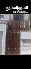  1 تركيب سياج خشب .