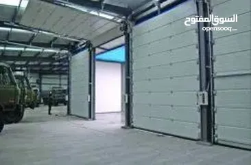  3 Industrial lifting door's.