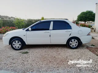  9 ميتسوبيشي لانسر للبيع موديل 2005