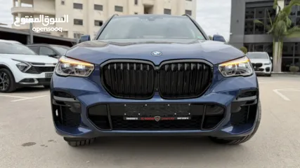  4 BMW X5 ترخيص 2022 ص   محرك 3000 هايبرد plug in/يقطع على الشحنه 80 كيلو متر  399 حصان