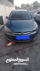  5 أوبل أسترا 2015 أوتاماتيك ماتور 1400 سي سي تيربو فتحة بالسقف لون أزرق