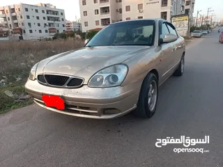  1 دايو نوبرا 2 لون ذهبي موديل 1999