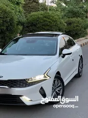  2 كيا K5 2021 فل كامل بانوراما فحص 7 جيد بحالة الشركة للبيع كاش او اقساط دفعة 10 الاف من المالك مباشرة