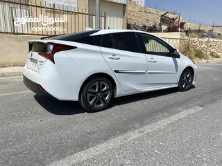  4 تويوتا بريوس تصلح للاعفاءات والجمرك 2022 ماشيه 10 الاف فحص 4 جيد صنف Xle فل كامل