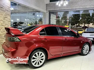  21 ميتسوبيشي لانسر موديل 2015 GT اصلي فحص كامل بحالة الوكاله فل كامل اعلى صنف من فئتها