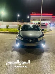  4 تويوتا كورولا موديل2015 فحص كامل لون فيراني مميزه   وغرفه بيج  مميزه جدا  فحص كامل 7 جيد ملاحظه السي