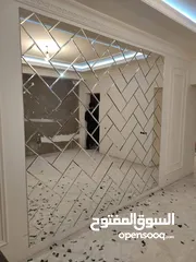  13 وتركيب السيكوريت والشور بوكس وجميع أعمال الزجاج والألمنيوم بجودة عالية"