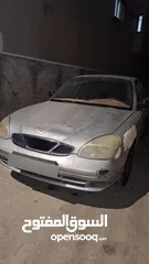  2 دايو نوبيرا  موديل  2000 ماتور 1600 يد أولى  لون فضي  ماتور وجير بحالة ممتازه