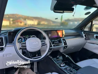  15 كايا سورينتو /2022 فل الفل  فتحة سقف بانوراما  4x4 ///240Hp بنزين + كهرباء  ( Haybrid) 1600cc