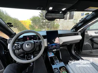 8 Honda E:NS1 E4 electric 2023  هوندا e:ns1 فئة E4 فل اضافات، اسود ميتاليك، داخليه لون ابيض فخمة