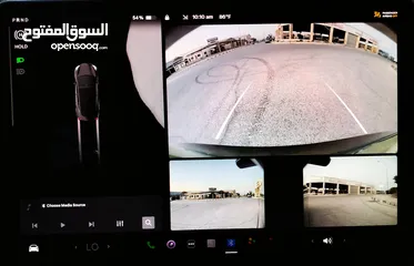  18 تيسلا 2023 model 3 فحص كامل اوتوسكور لون اسود ملوكي داخلي ابيض بحالة الوكالة للبيع بسعر لقطة ومحرووق