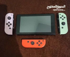  1 نينتندو سويتش مع 5 العاب وأيد و شاحن