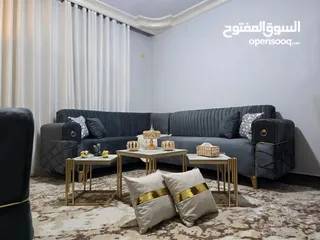 1 جدد غرفة ضيوفك.. طقم كورنر 9 مقاعد لون اسود قماشه ووتربروف خشب سويد استعمال بسيط جدا اقل من شهر