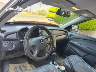  27 ميتسوبيشي آوتلاندر اوتوماتيك 2003 توب نظافة بسعرررر مميززز محرك 2400cc