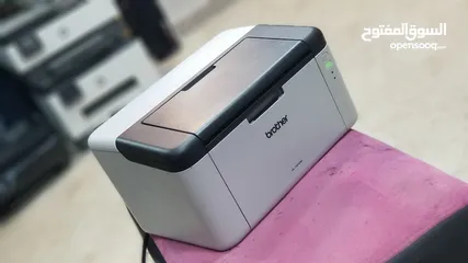  1 طابعة برذر ليزر اسود تدعم الويرلس