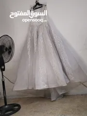  1 مستعمله معها تاج طرحه