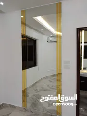  11 تفصيل تنفيذ وصيانة ابواب واجهات السيكوريت بافضل جوده ووقت وسعر