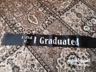  1 باجة تخرج سوداء بكتابة بلون ابيض I Graduated جديدة للبيع