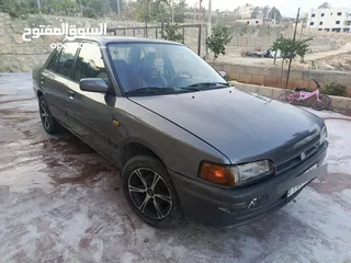  2 مازدا 323 1992