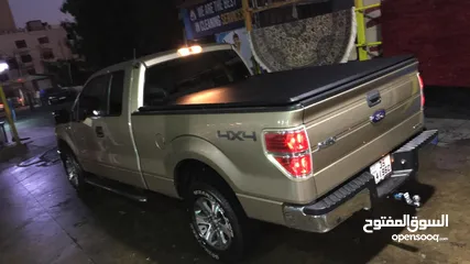  25 فورد F - 150 للبيع دفع رباعي 2014 كبينة و نص لون ذهبي فحص كامل 7 جيد للبيع نقداً قابل للتفاوض