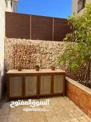  26 شقه في حي ابو الراغب 203 م مع حديقه مساحة 180 م تقريبا