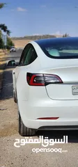  5 Tesla Model 3 Standerd Plus 2022 ابيض وداخليه ابيض جمرك جديد شهر 12‎ بسعر 20 الف بدون الرقم
