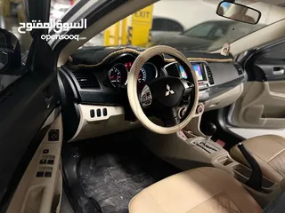  14 ميتسوبيشي لانسر 2016 كرت ابيض