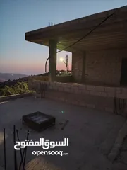  22 ارض للبيع مساحة4300م وعلى الواقع 12دونم تصلح بيت ريفي شاليه ارض زراعيه ويوجد فيها بيت قيد الانشاء