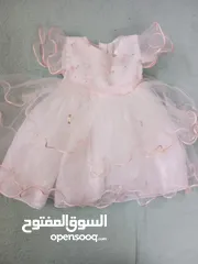  2 فساتين بيبي من 9 شهور ولغاية سنه وارد امريكي مستعمل بحالة الجديد خلي بنتك مع الصيفيه برنسيسه