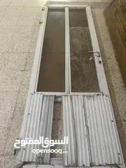  12 شبابيك الألمنيوم + أبواب خشب للبيع بحال الوكاله