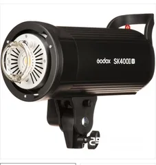  2 اضاءة godox flash sk 400ii v شبه جديدة بالكارتون