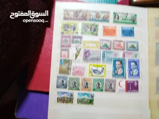  5 نيشان ملكى وزن41, 41 جرام من الدهب والفضه وعقدفضه من الاحجار الكريمه وطوابع قديمه نادره