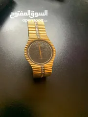  1 ساعه مطليه ذهب وسلفر للبيع   اصليه وجديده
