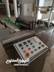  1 الة لتغليف علب الكرتون من الخارج بورق السيلوفان الشفاف..