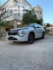  2 MITSUBISHI OUTLANDER  MONTERO SPORT