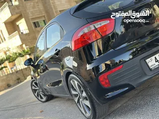  9 كيا ريو 2016 فل مع فتحه مميزه لون اسود نادر ومميز بالنضافه