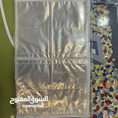  9 كروت بوكيمون والبومات (Pokemon cards and binders)
