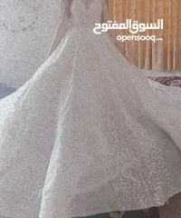  1 فستان عروس ( شبه جديد ) مع كمالياته طرحة شك خرز وبرنس وتاج للبيع مش للاجار استعمال مرة واحدة لعروس.