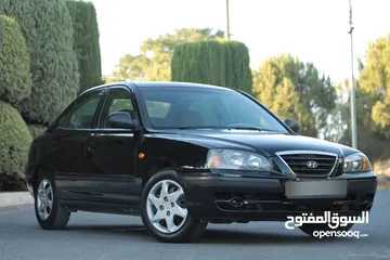  14 هيونداي النترا افانتي 2006 وارد وكاله الاردنيه فحص كامل جير اتوماتيك قاطعه مسافه 140 الف كم لون اسود