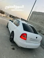 5 سكودا نيو 2006 دهان جديد  فحص ممتاز وتخلو من القص والضربات هيئه جديد فرش جلد  شاشه اندرو