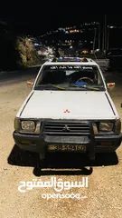  7 مستبيشي 1998 L200 لون ابيض للبيع اقساط دفعه 1000بحاجت ترخيص منتهي 6اشهر للستفسار