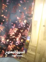  2 فستان اسود موديل صيني مطرز مصنوع من قماش الساتان الناعم مناسب للسهرة او للعيد..... جديد غير مستعمل