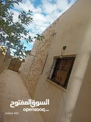  14 منزل مستقل للايجار فارغ  في مأدبا ، الفيحاء، إسكان التطوير ، منزل رقم 91.شبه فيلا.مخزن منفصل .