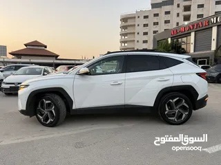  18 هونداي توسان ترخيص 2022 محرك 1600 هايبرد plug in/يقطع على الشحنه 65 كيلو متر  271 حصان